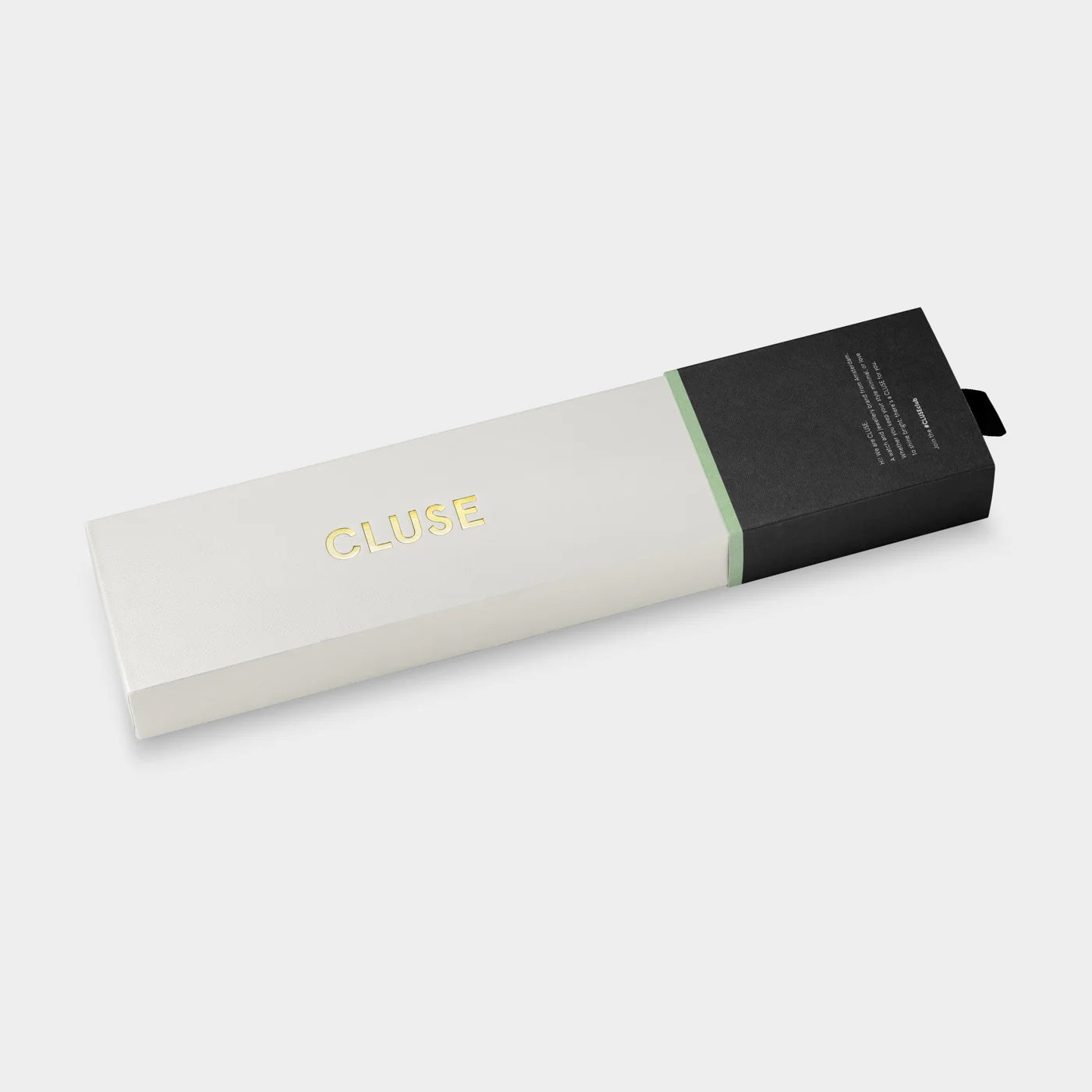 Verpackung zu der goldfarbenen Cluse Gracieuse Petite Damenuhr mit rechteckigem Gehäuse und dunkelrotem Zifferblatt