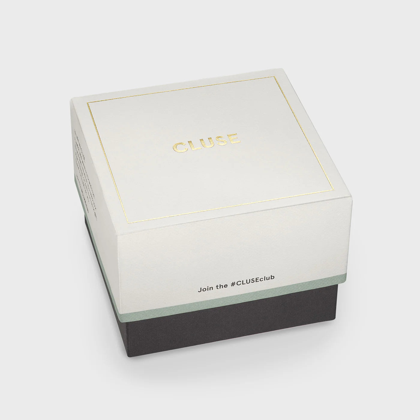 Verpackung zu der goldfarbenen Cluse Gracieuse Petite Damenuhr mit rechteckigem Gehäuse und beigem/bronze-farbenem Zifferblatt an einem Doppel-Armband aus Leder im gleichen Farbton wie das Zifferblatt