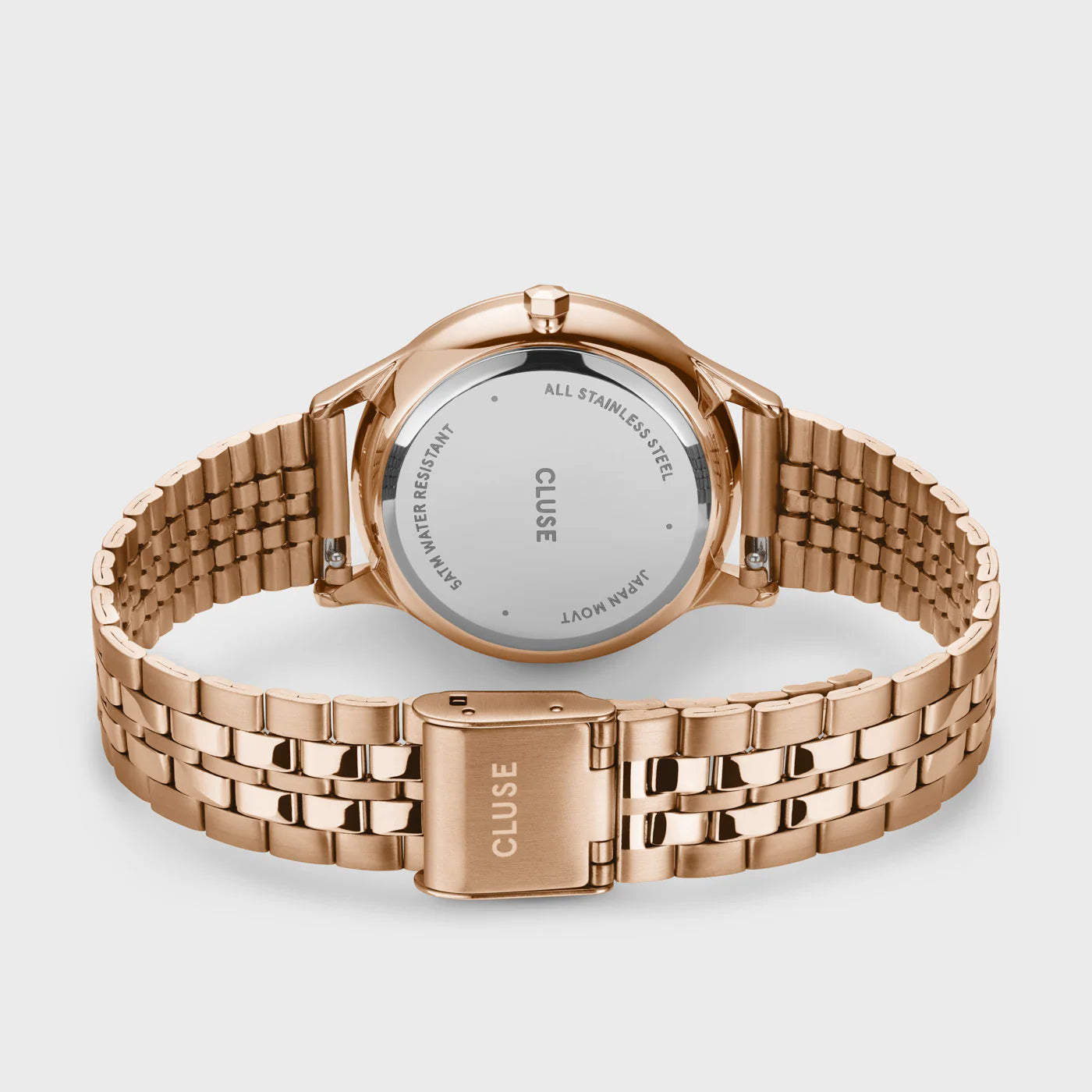 Blick auf das Armband der Cluse Stahl-Uhr "Minuit Multifunction" im Rosègold-Look mit weißem Zifferblatt und drei Sub-Dials zur Wochentags-, Datums-Anzeige und 24 Stunden-Zähler