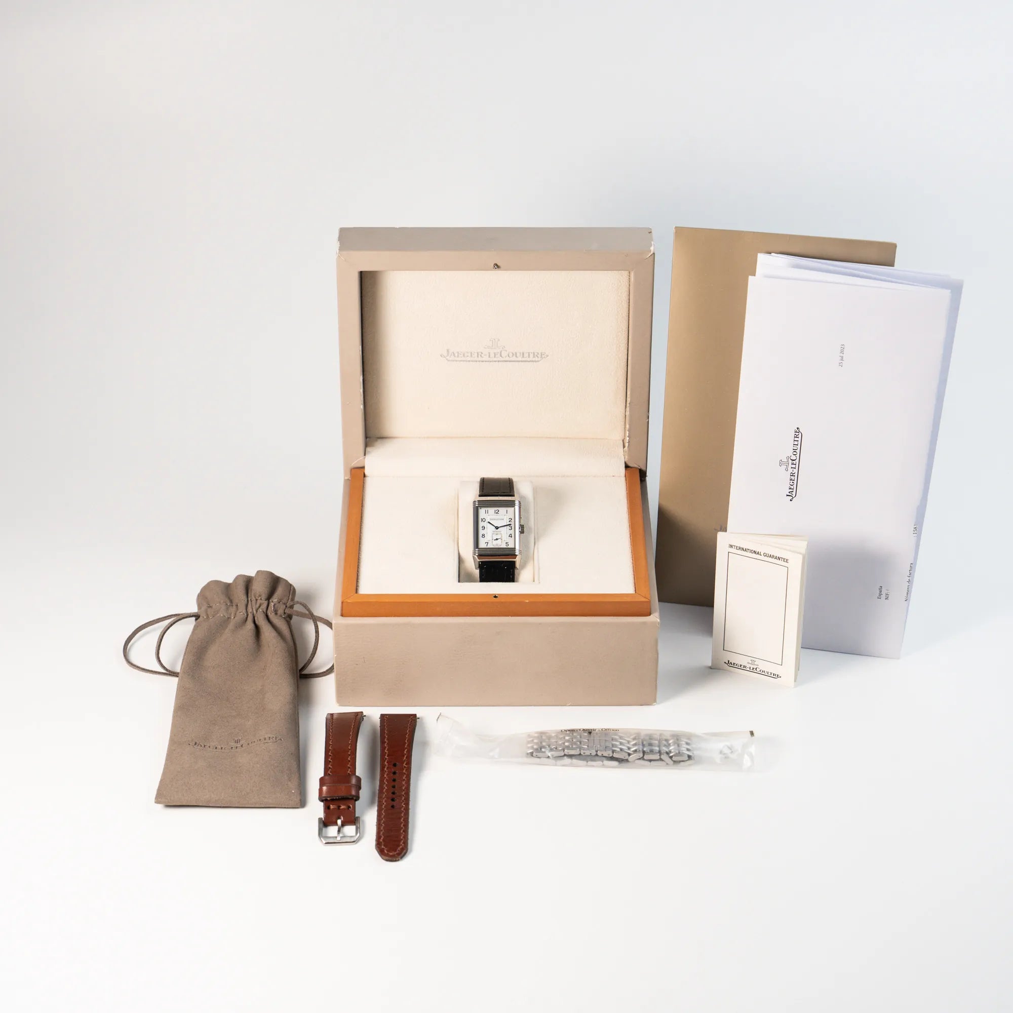 Jaeger LeCoultre Reverso Duoface 270.8.54 in Stahl zusammen mit dem Lieferumfang, betsehend aus Box, Paapieren und zusätzlichen Stahlband , sowie einem braunen Lederband