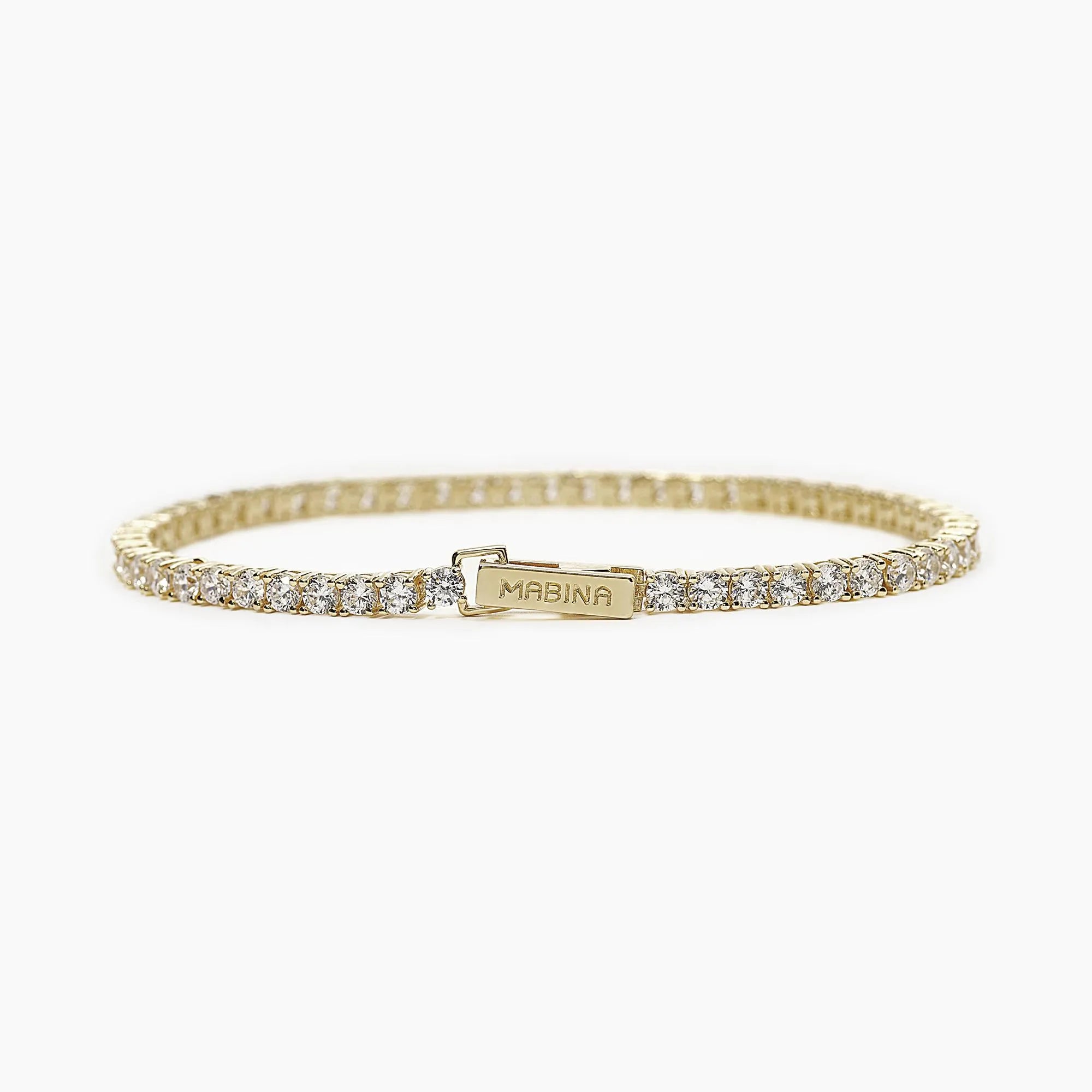 Produktfotografie des vergoldeten Tennisarmbands mit Zirkonia Steinen aus Silber