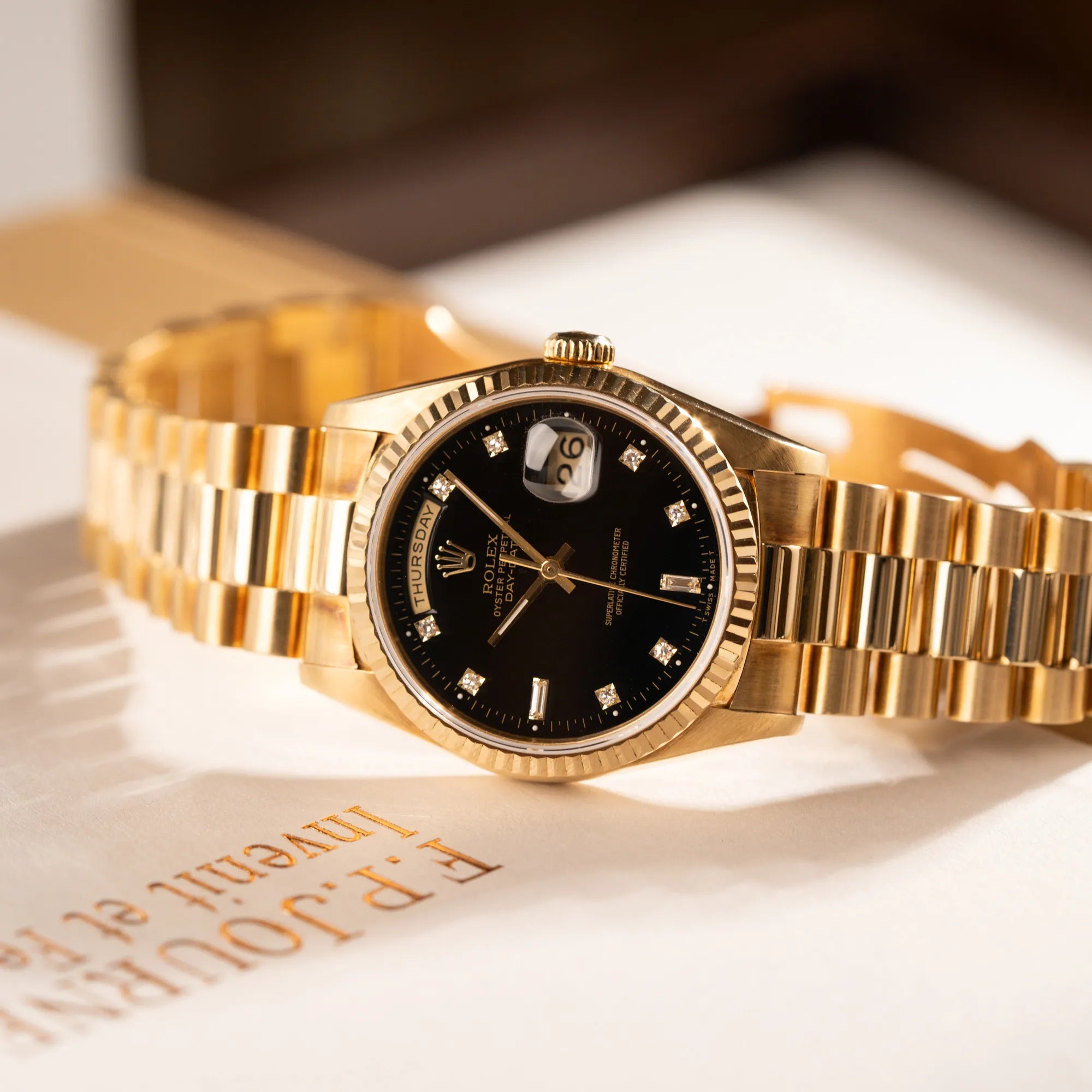 Rolex Uhren Rolex Day Date Gold Schwarzes Zifferblatt Diamond