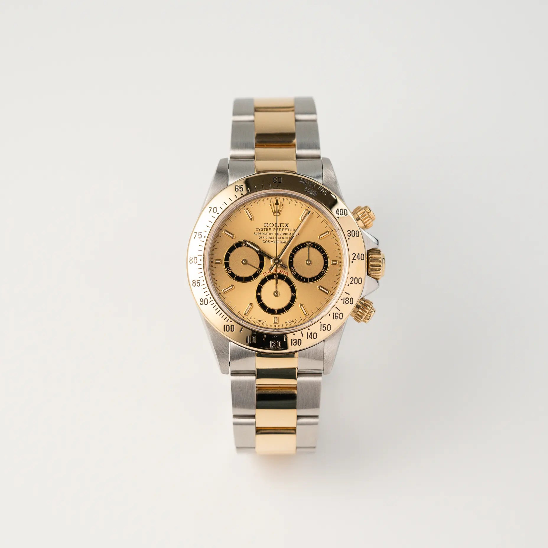 Frontale Ansicht der Rolex Zenith Daytona in Stahl-Gold mit goldfarbenem Zifferblatt