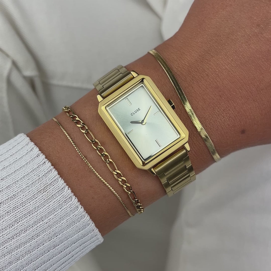 Wrist-Roll der Cluse "Fluette" Stahl-Uhr mit gelbgold-farbenem Zifferblatt und Gehäuse