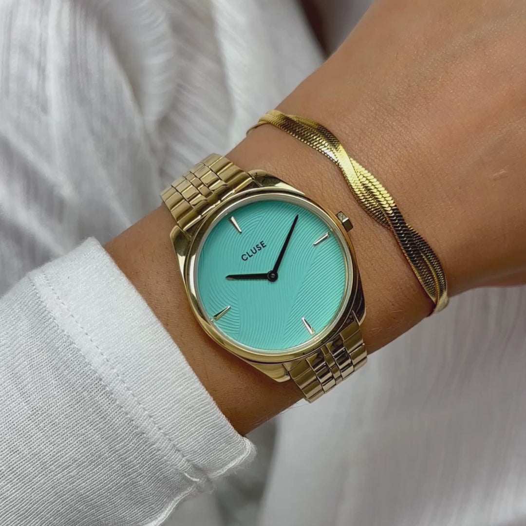 Wrist-Roll-Video der Cluse Stahl-Uhr "Féroce Petite" mit einem gelbgold-farbenem Gehäuse und einem tükis-farbenen Zifferblatt