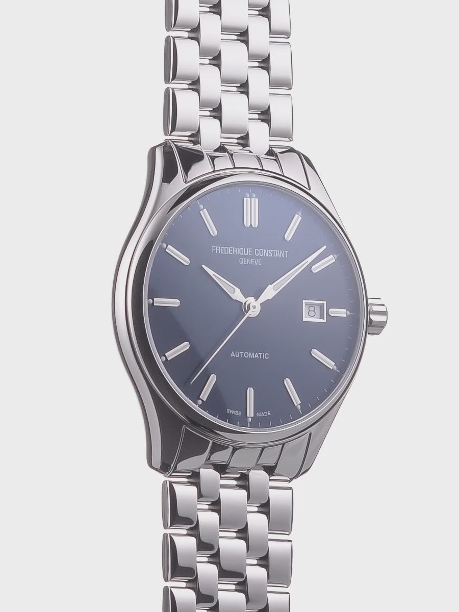 Produktvideo der Frederique Constant Classics Index Automatic mit einem Edelstahl-Gehäuse an einem Edelstahl-Armband mit blauem Zifferblatt, die sich um die eigne Achse dreht