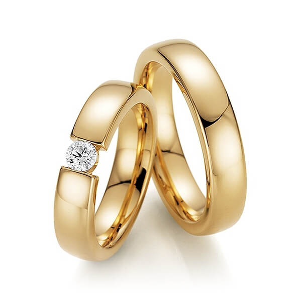 Fischer Trauringpaar Modell Bereicherung in Weißgold, mit einem großen Diamanten im Damenring