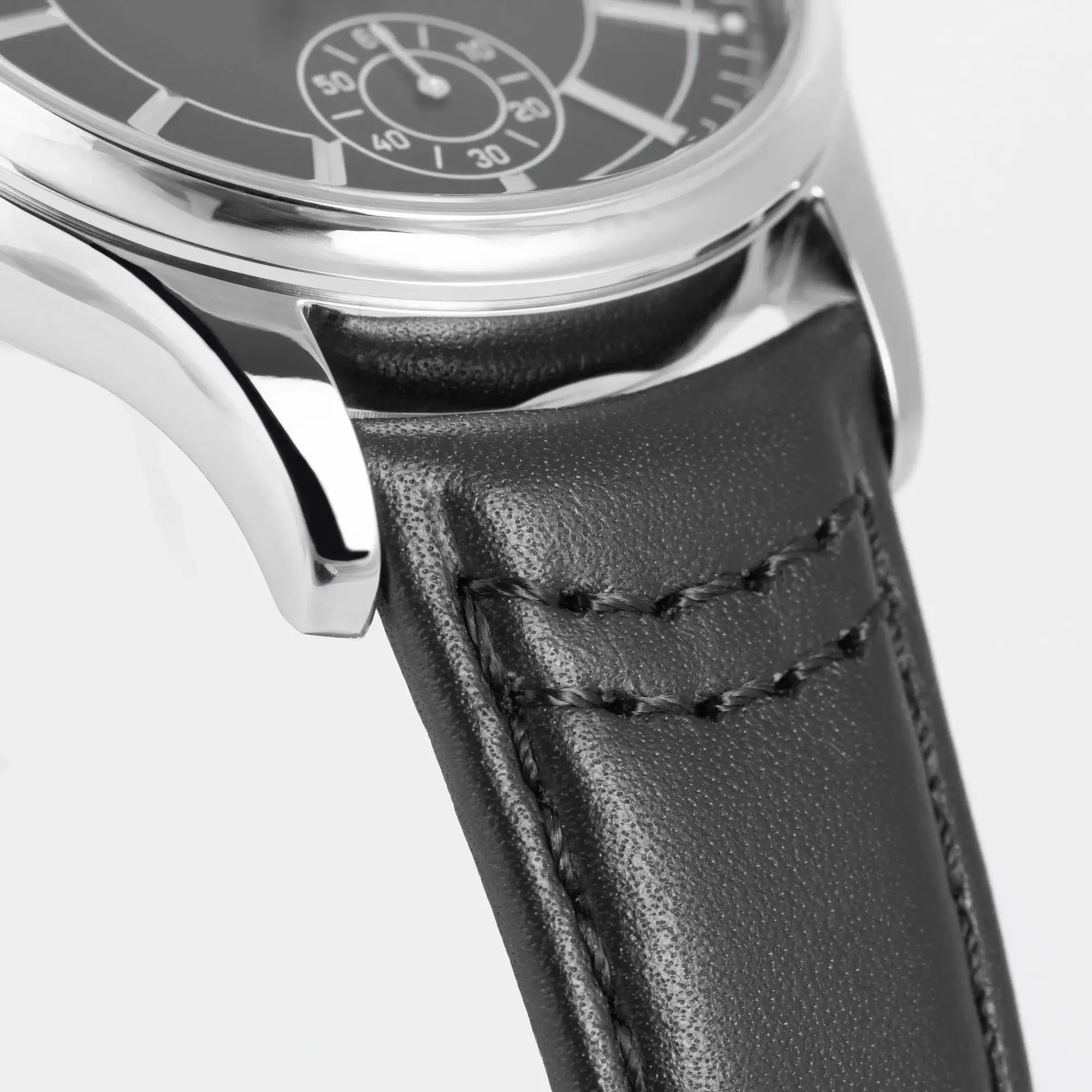 Bandanstoß der Jacques Lemans 1-2197A Derby Armbanduhr mit schwarzem Zifferblatt und schwarzem Leder