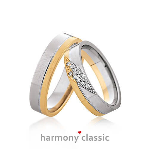 Produktfotografie des Trauringpaars Harmony Classics in Weißgold und Gelbgold mit 10 Diamanten im Damenring