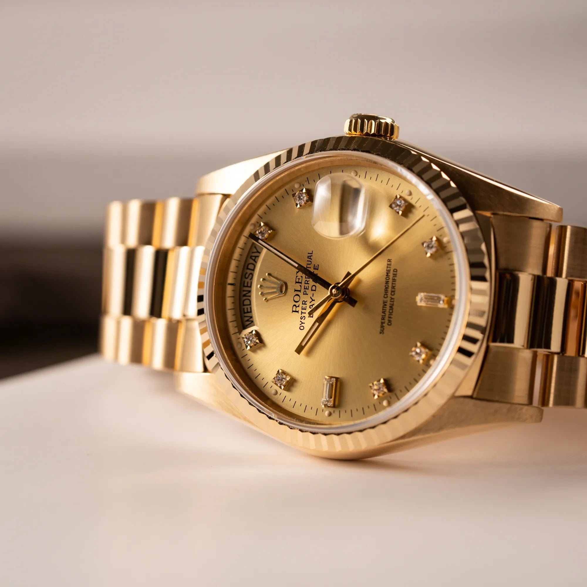 Titelbild der Rolex Day-Date 36 mit der Referenz 18238 und Champagne-Diamant-Zifferblatt