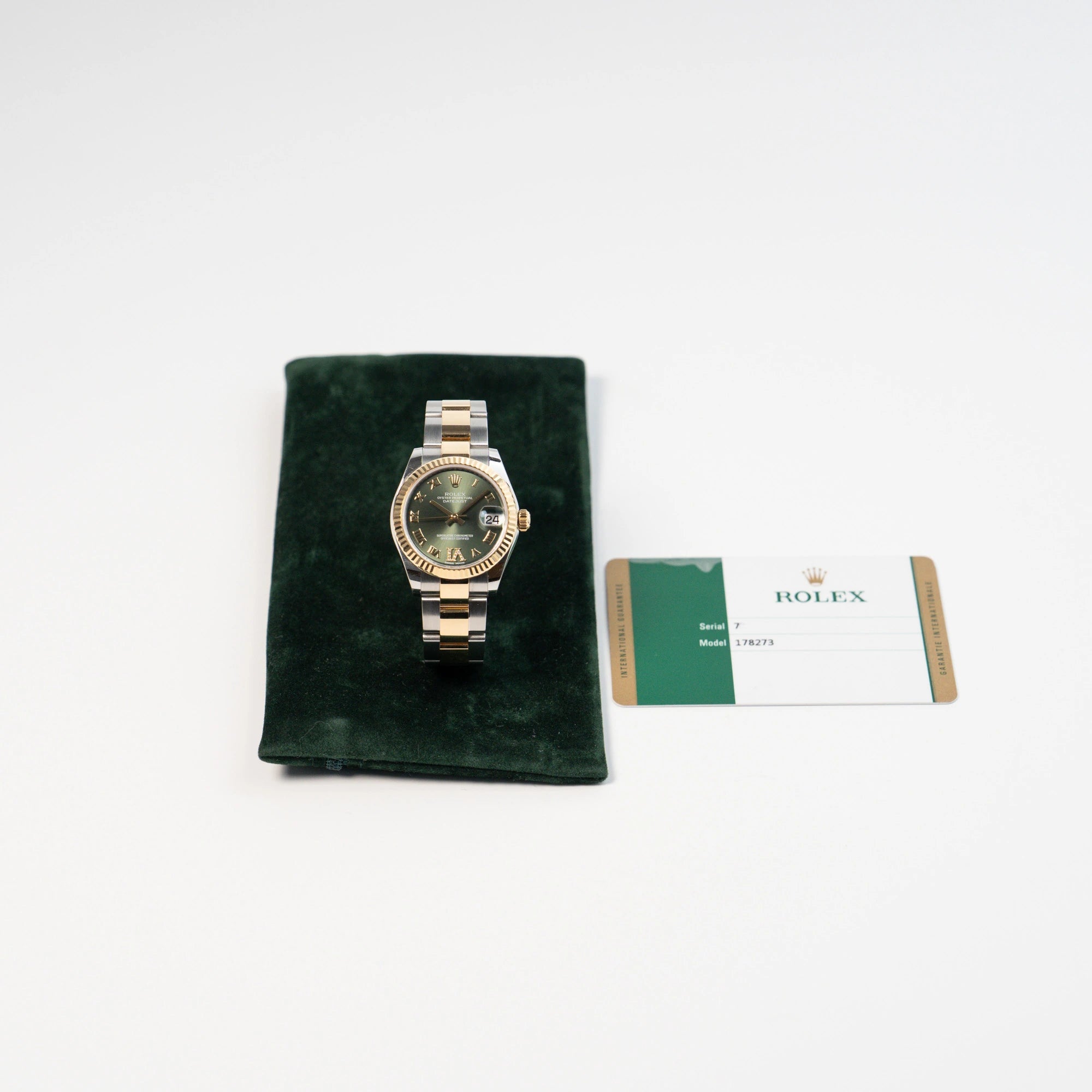 Rolex Datejust 31 mm für Ladies mit einem oliven Zifferblatt und einem diamantbesetzten Index zusammen mit dem Lieferumfang, betsehend aus einer Travel-Pouch und der originalen Rolex-Karte